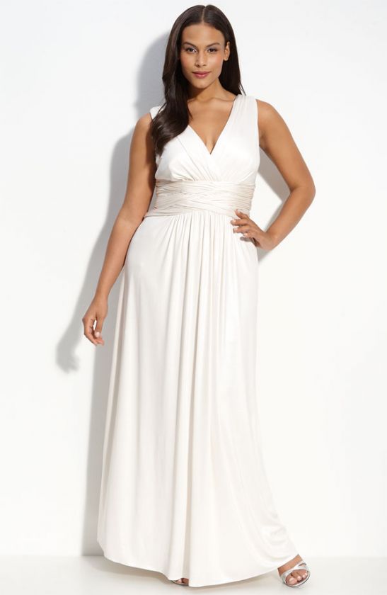 Grecian inspiration shows in the ruched, crossed sash of a gorgeous 