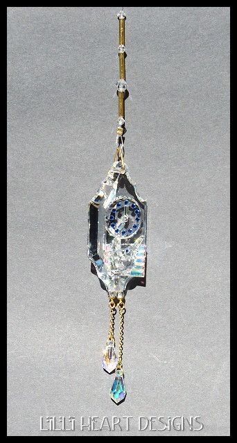 CUCKOO CLOCK AND BIRD MADE FROM SWAROVSKI CRYSTAL RETIRED  