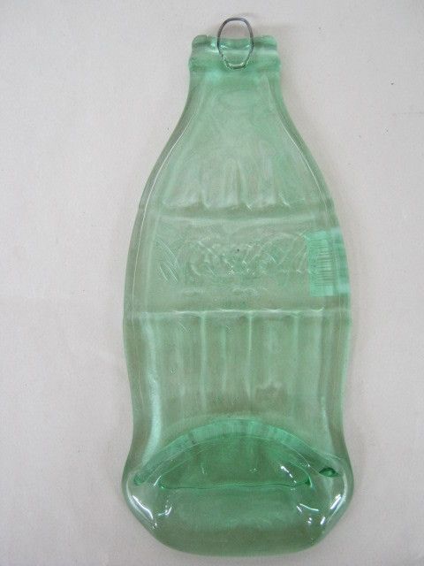 COCA COLA BOTTLE SLUMPED FLAT WITH WIRE TO HANG  