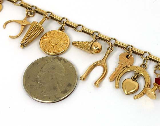 EXQUISITE VINTAGE 14K GOLD CHARM BRACELET W/ 17 CHARMS  